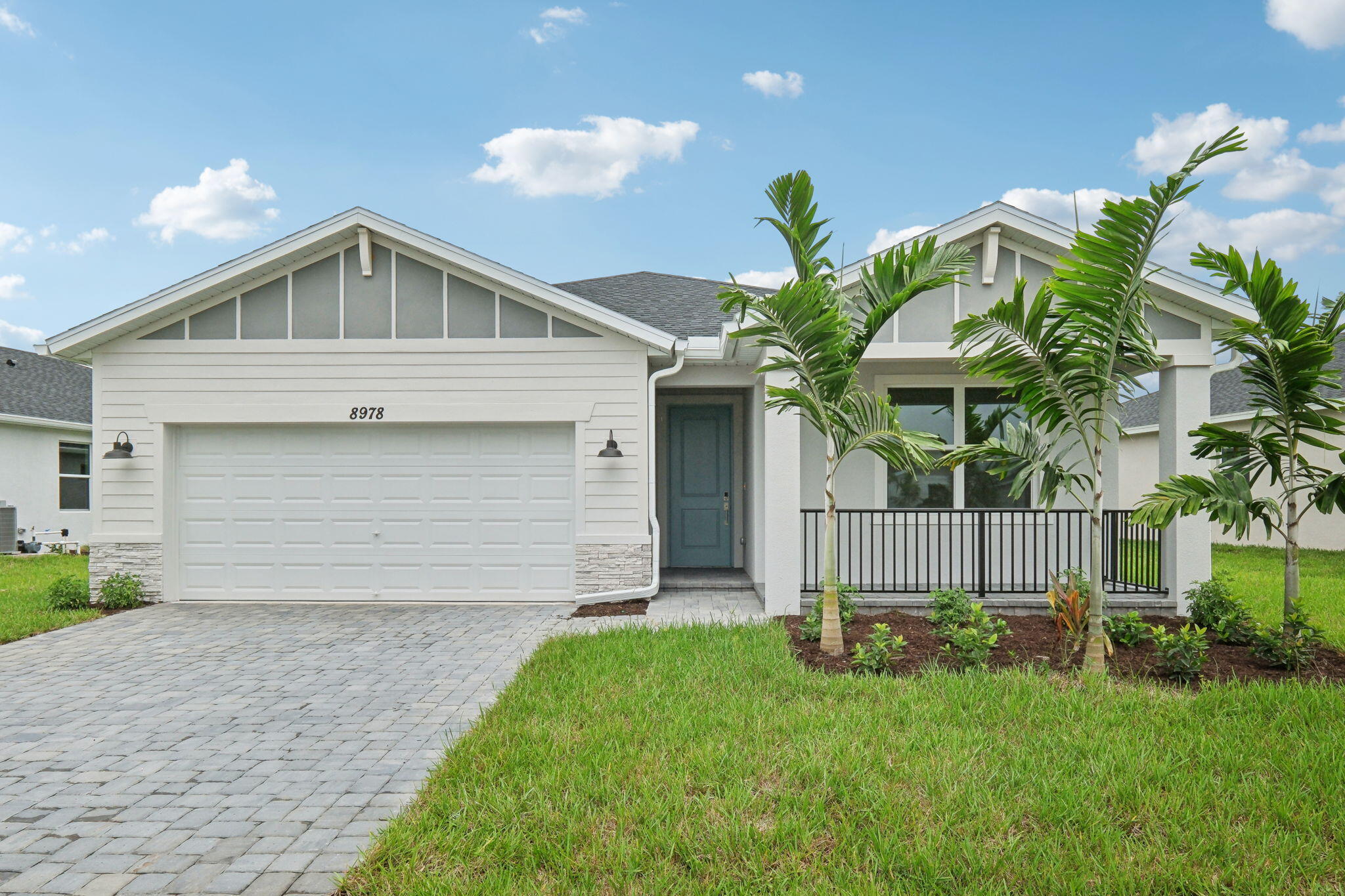 a front view of house with yard and seating