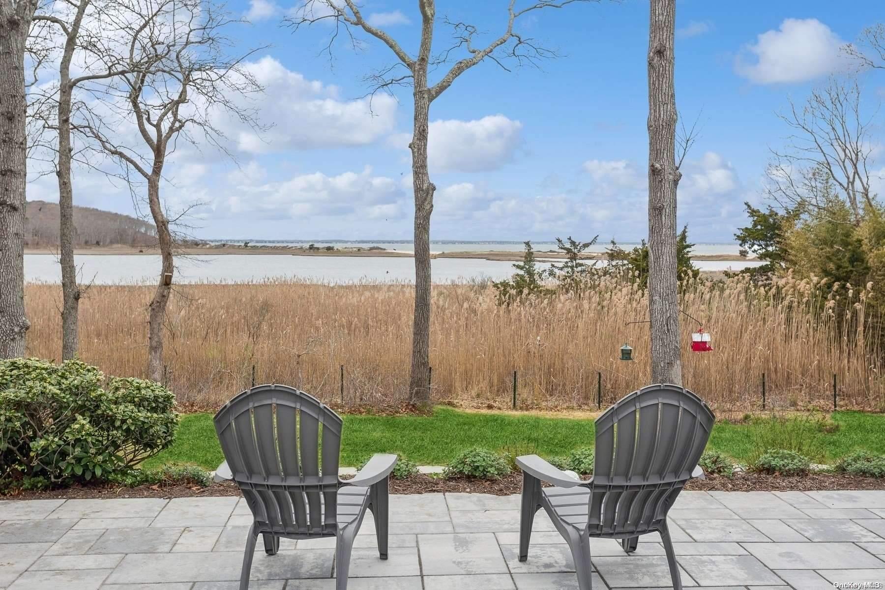 a table and chairs with the view of outdoor space