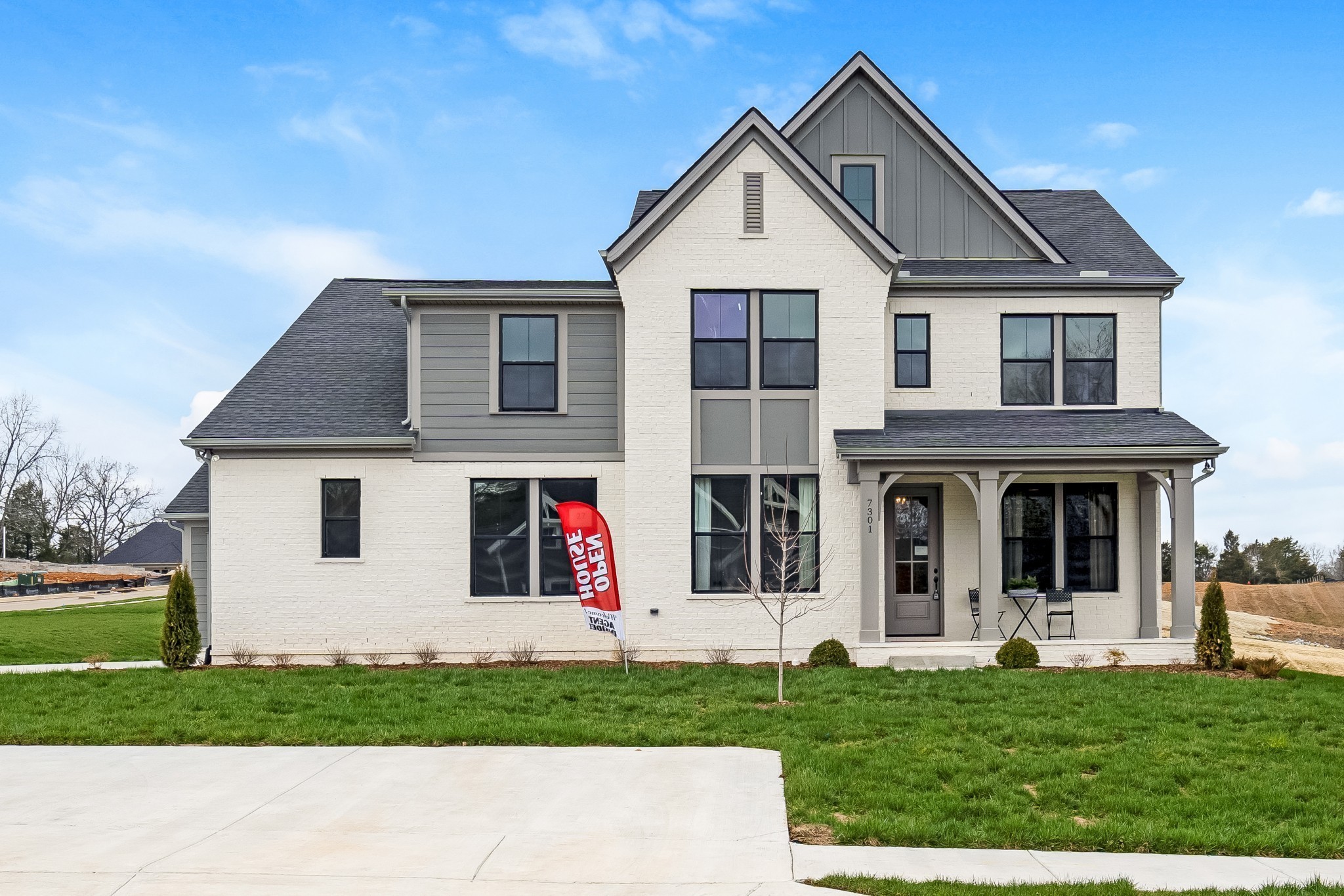 a view of house with yard