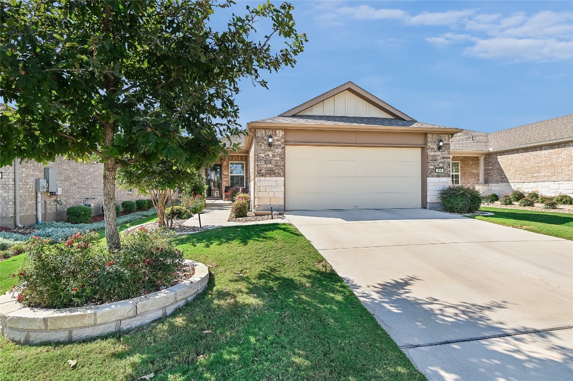 Why wait for new construction when you can get an already established newer home in Sun City? The exterior features on 216 Comal Ln include established landscaping, and an extended 4 ft garage.