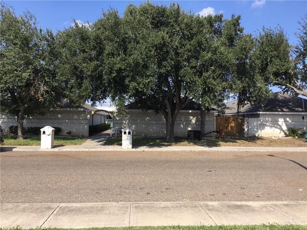 a house with trees in front of it