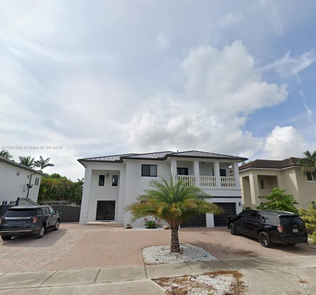 a view of a house with a patio