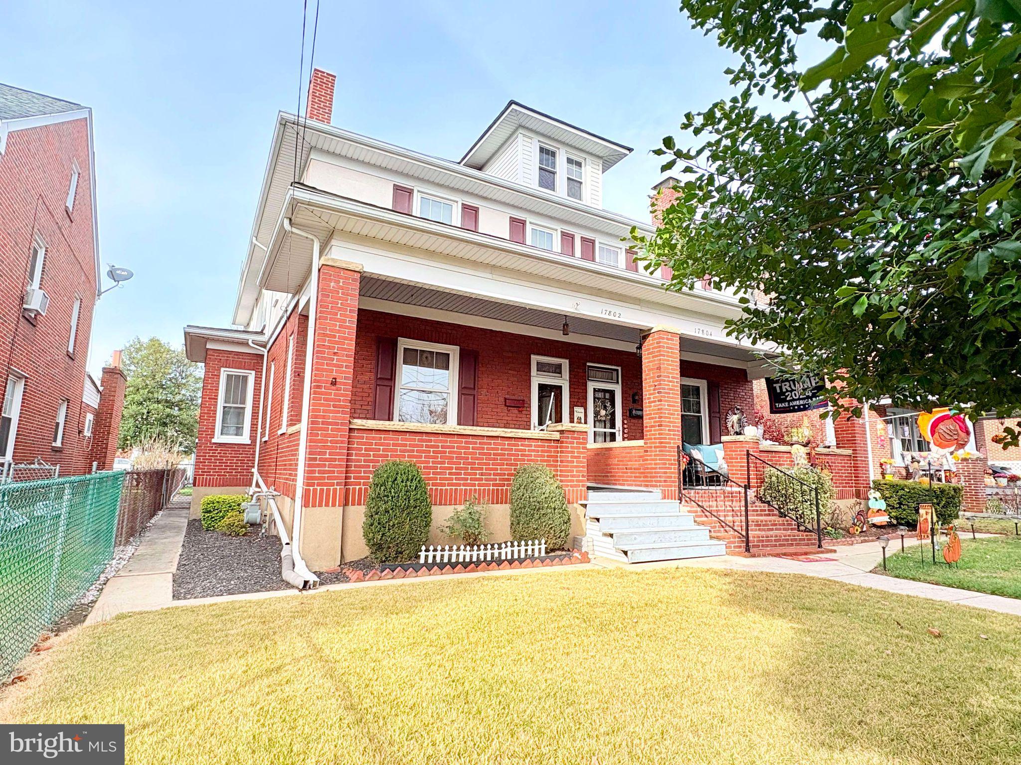 a front view of house with yard