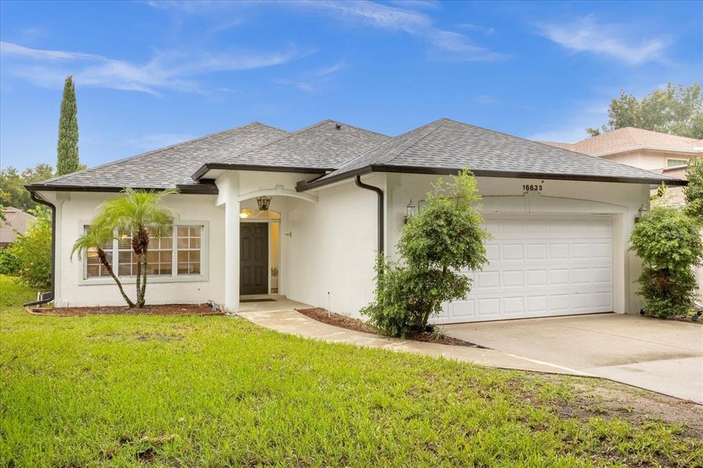 front view of a house with yard