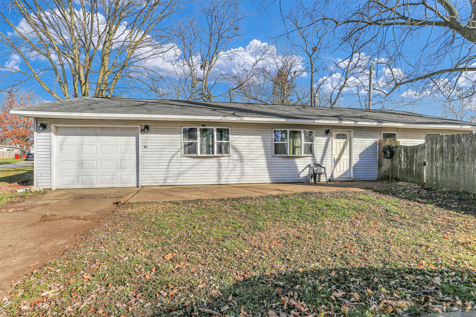 front view of a house with a yard