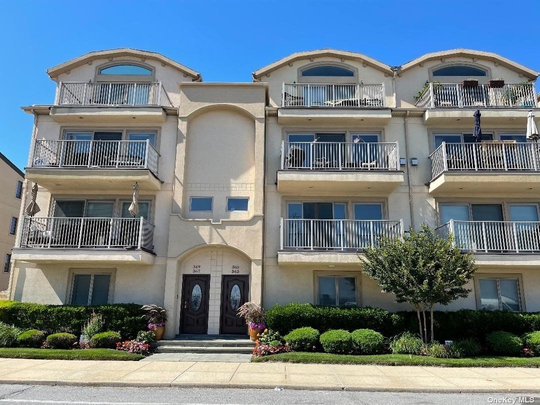 a front view of multi story residential apartment building