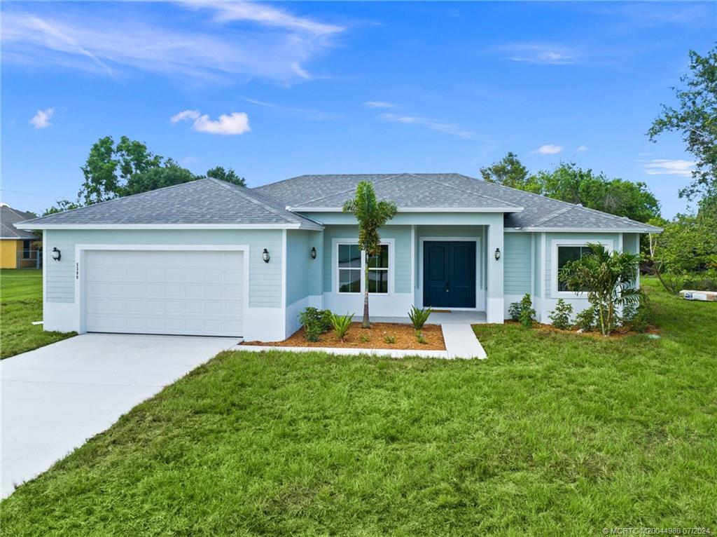 front view of a house with a yard