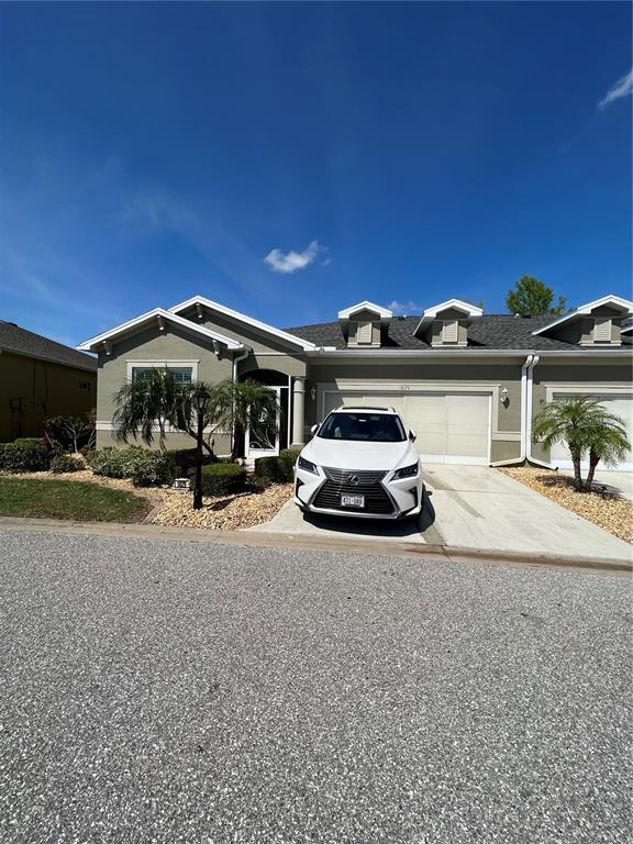 a car parked in front of a house