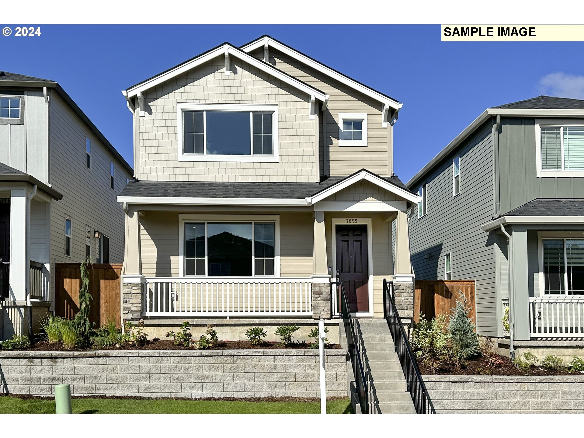 a front view of a house with yard