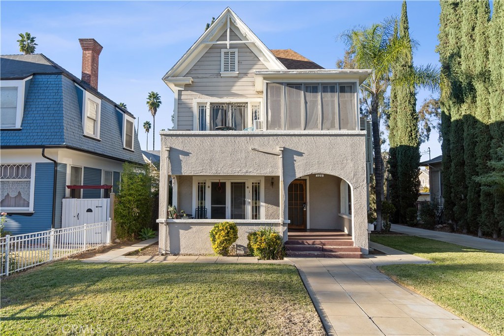 a front view of a house with swimming pool