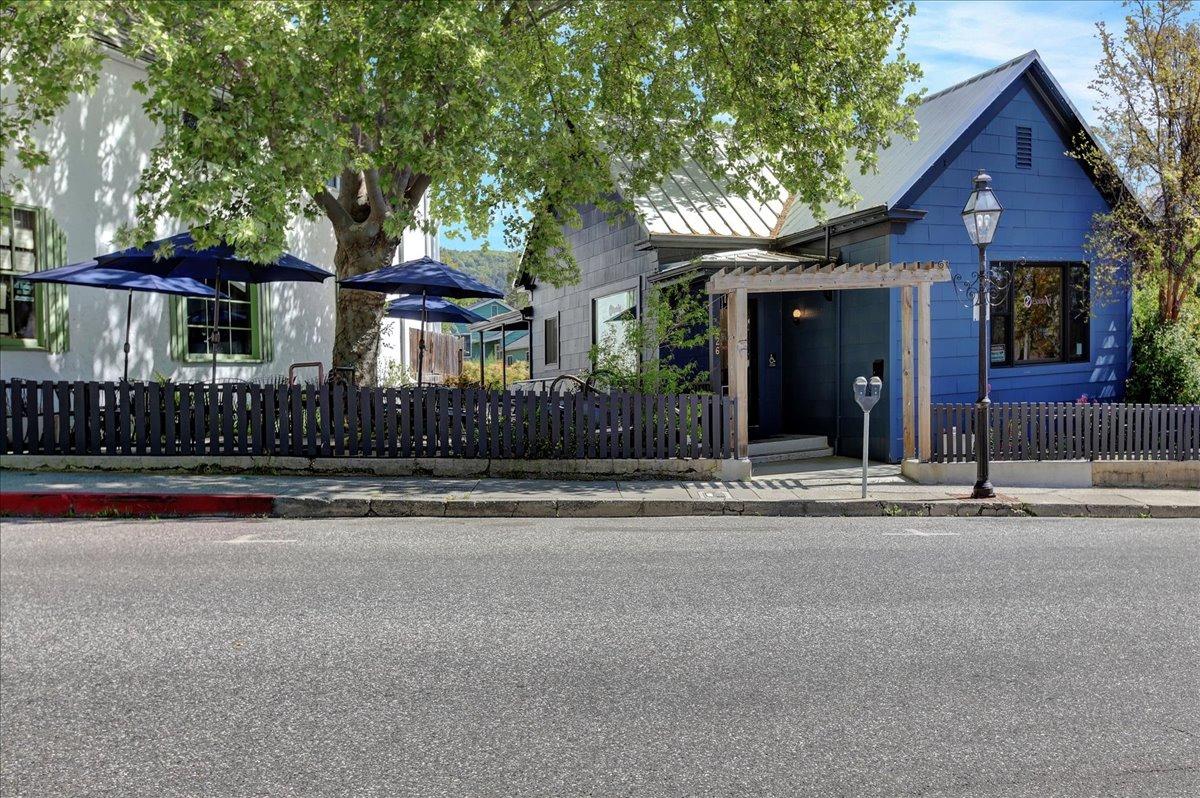 front view of a house with a small yard