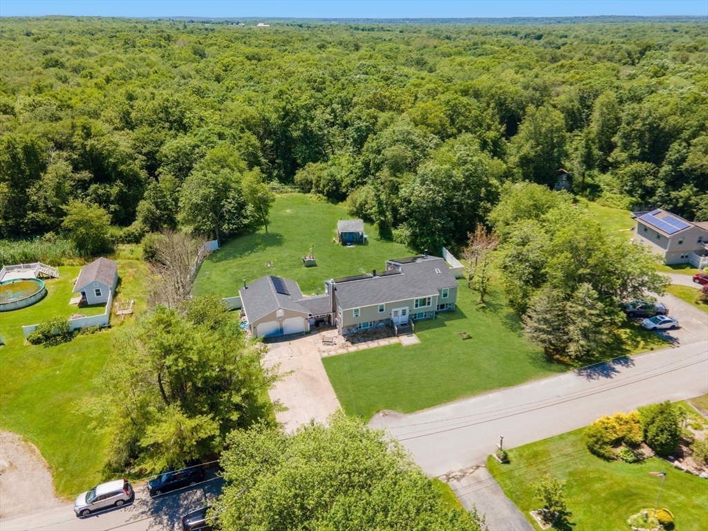 an aerial view of a house with garden