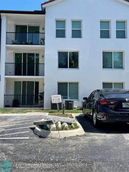 a car parked in front of a building