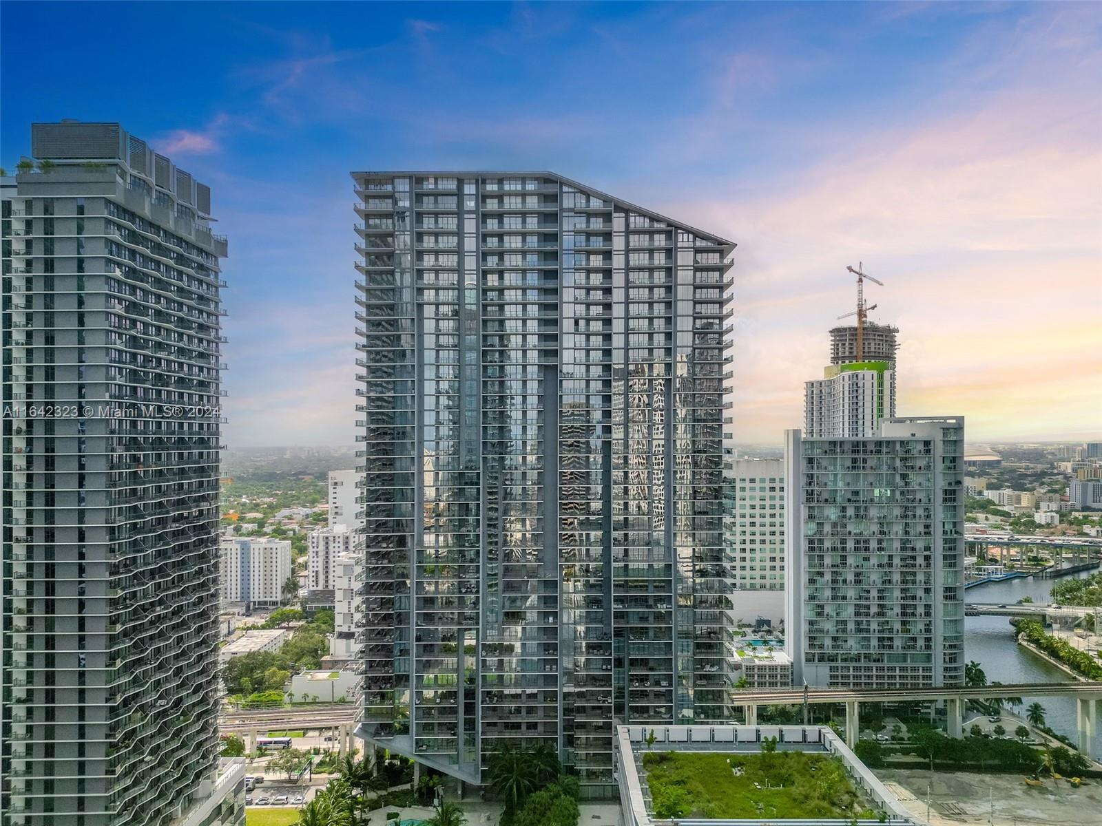 a view of a city with tall buildings