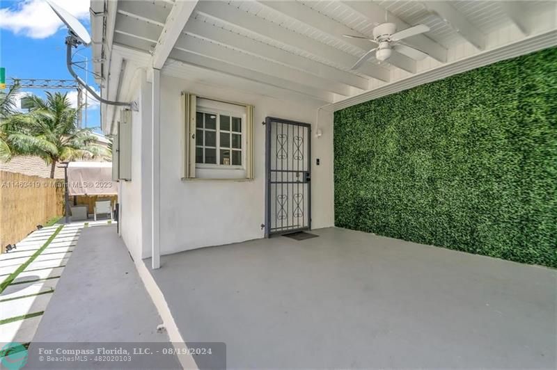 a view of a porch with plants