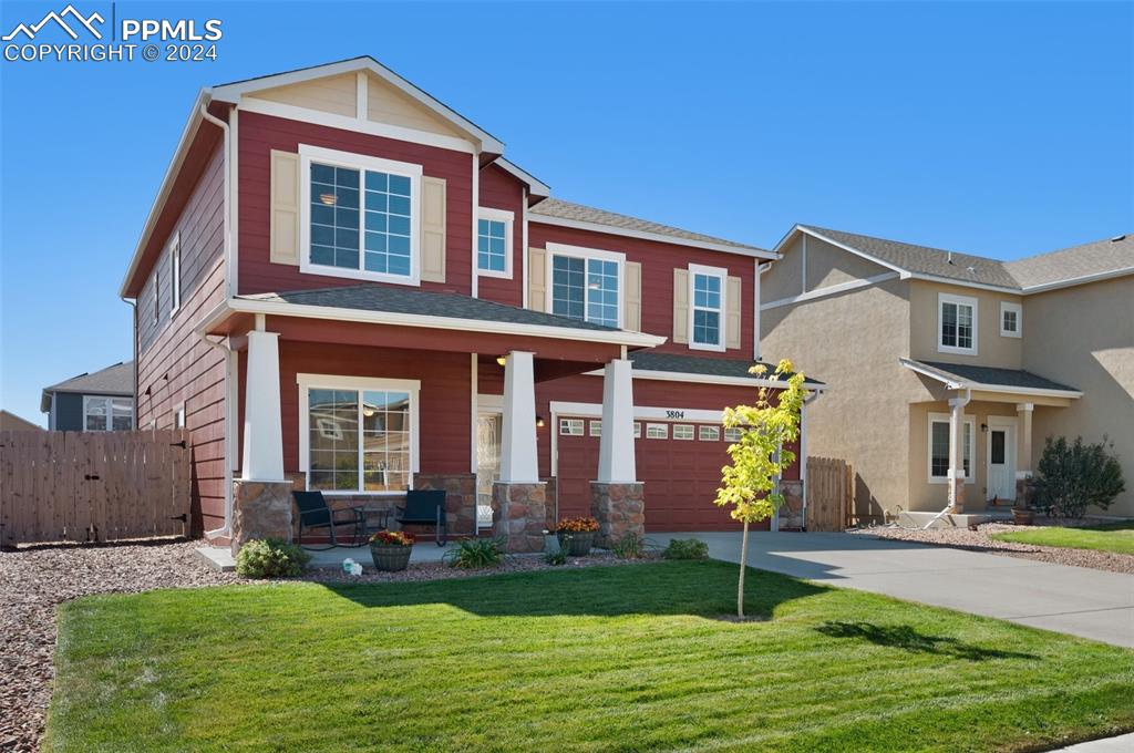 a front view of house with yard