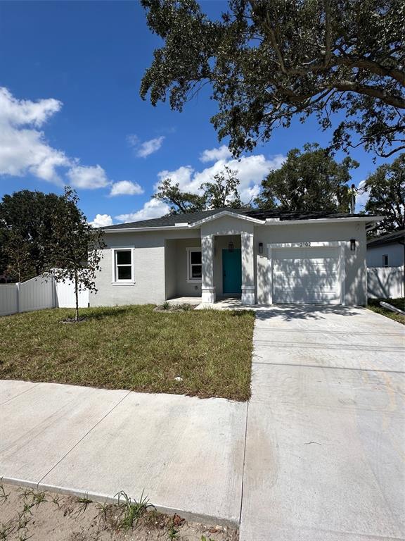 front view of a house with a yard