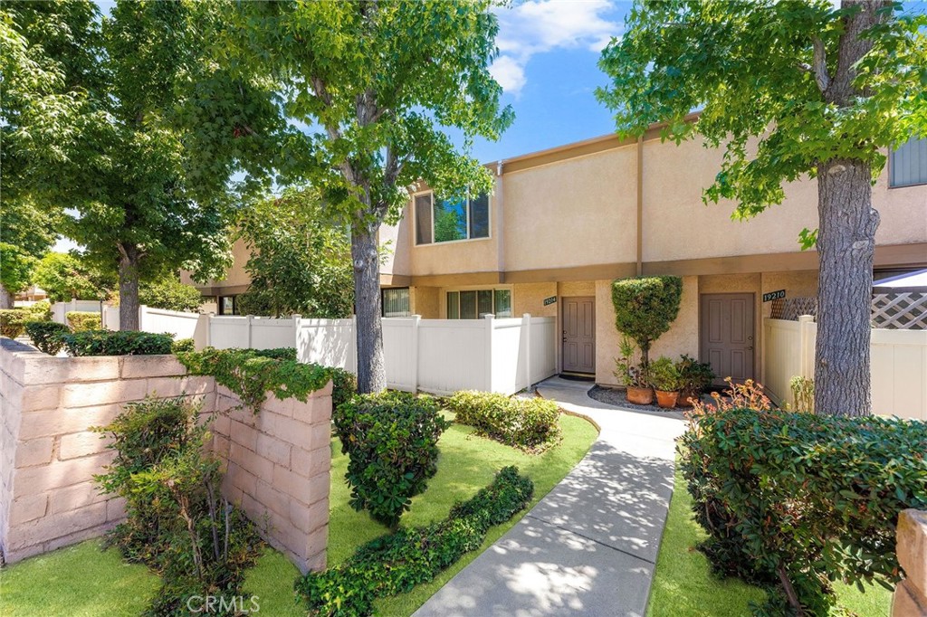 a house view with a garden space