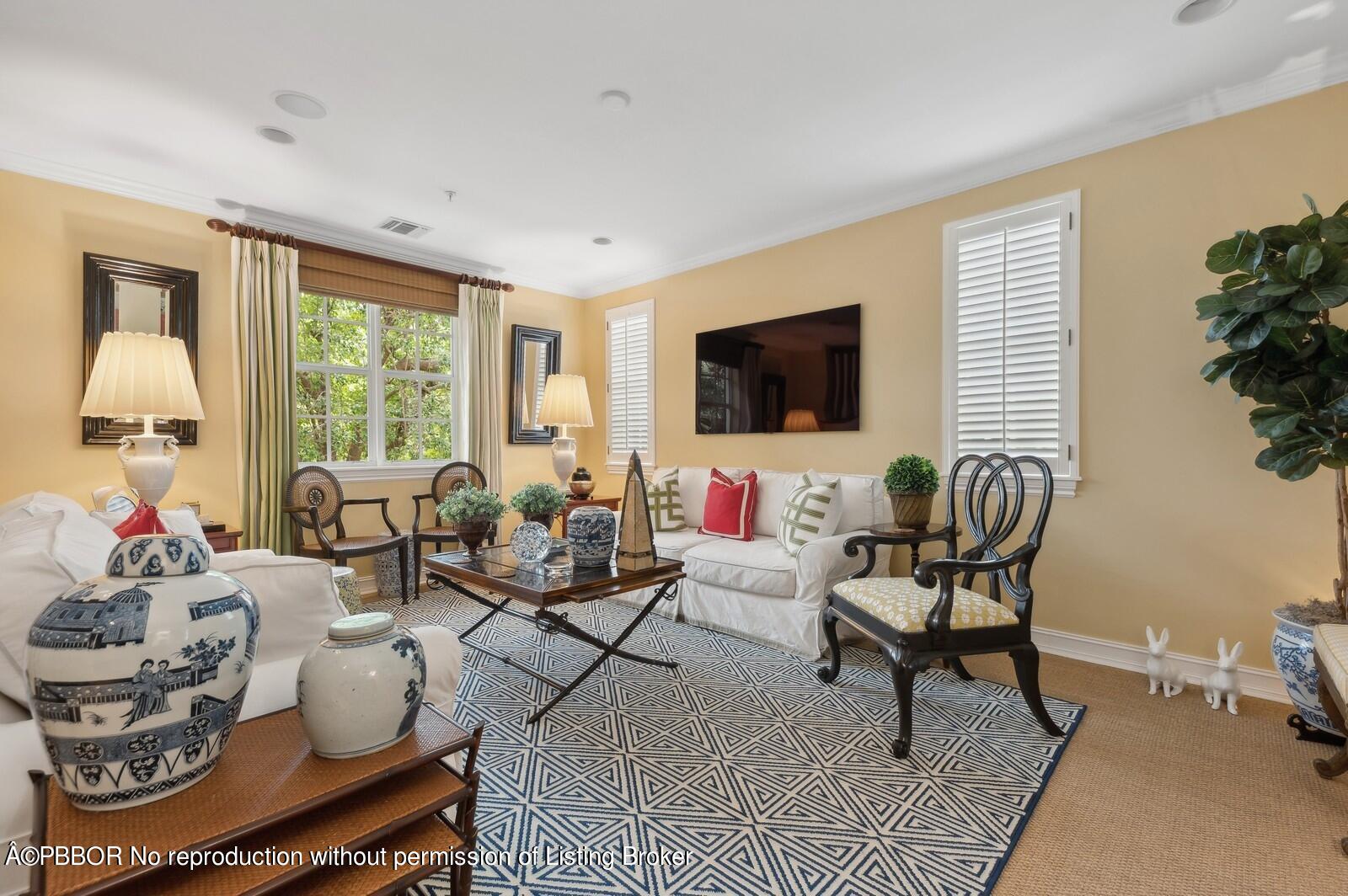 LIVING ROOM with windows to east & south