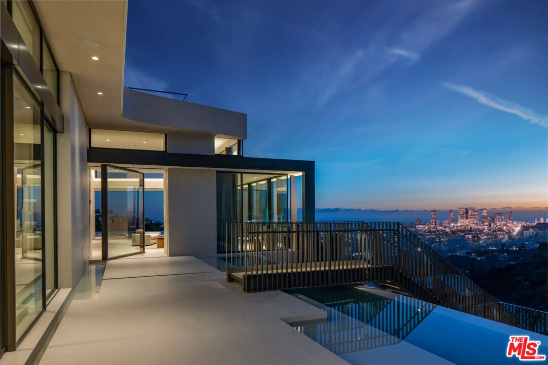 a view of a balcony with city view