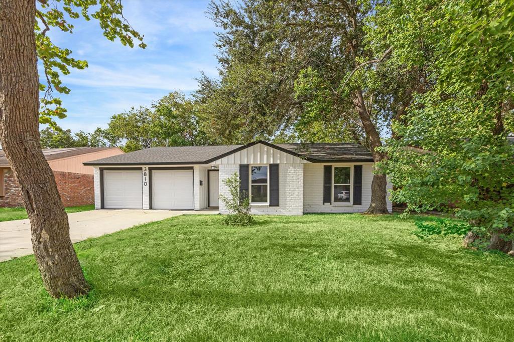 a house with trees in the background