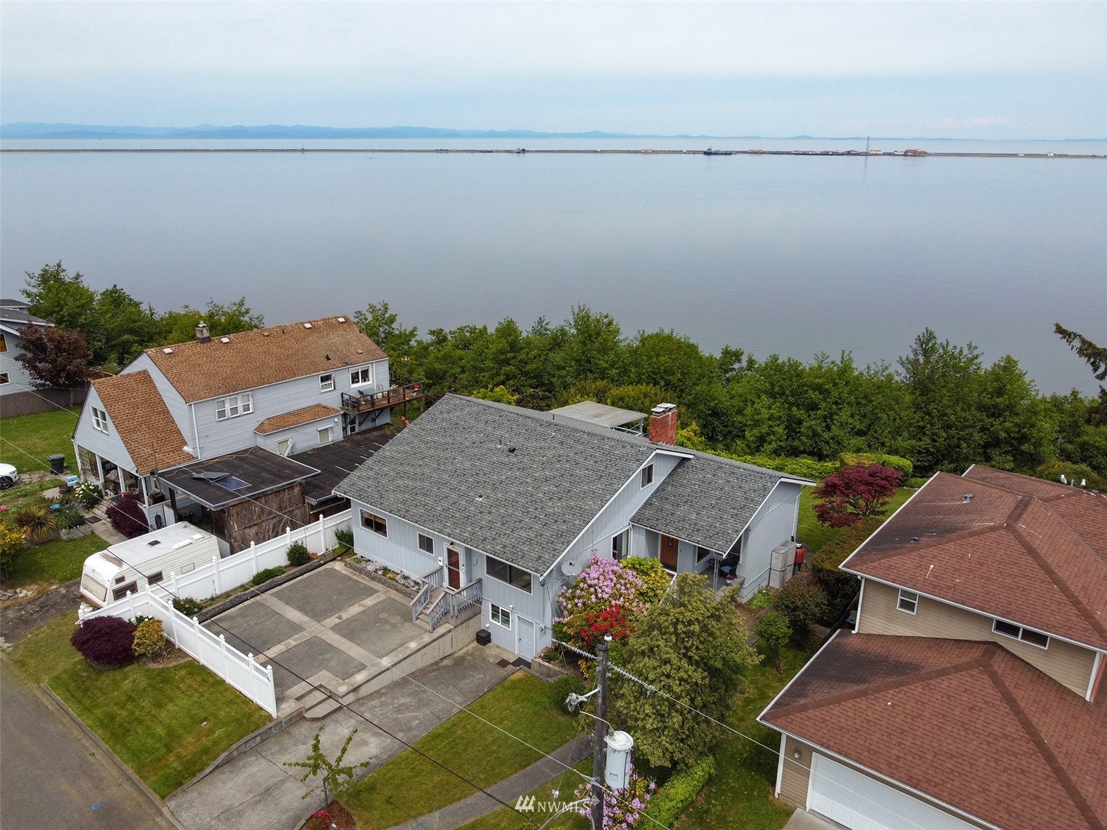 an aerial view of a house with a garden