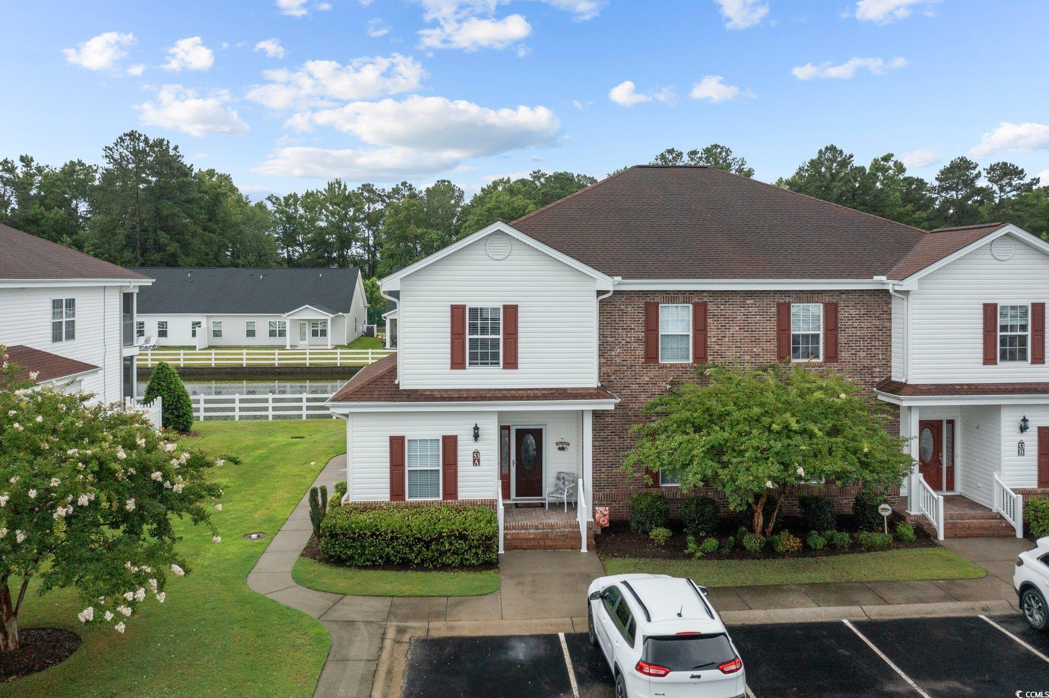 View of front of house with a front lawn