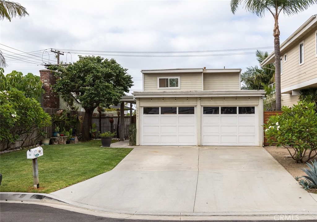 Front yard that can fit four cars in driveway