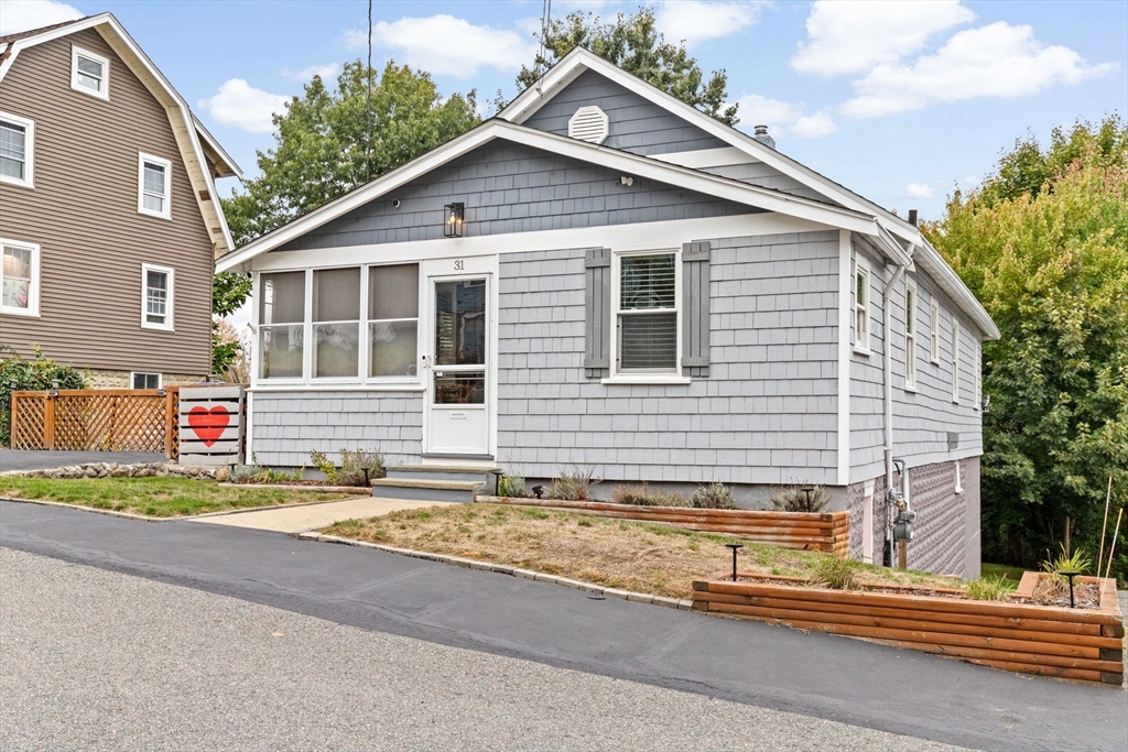 a view of a house and a yard