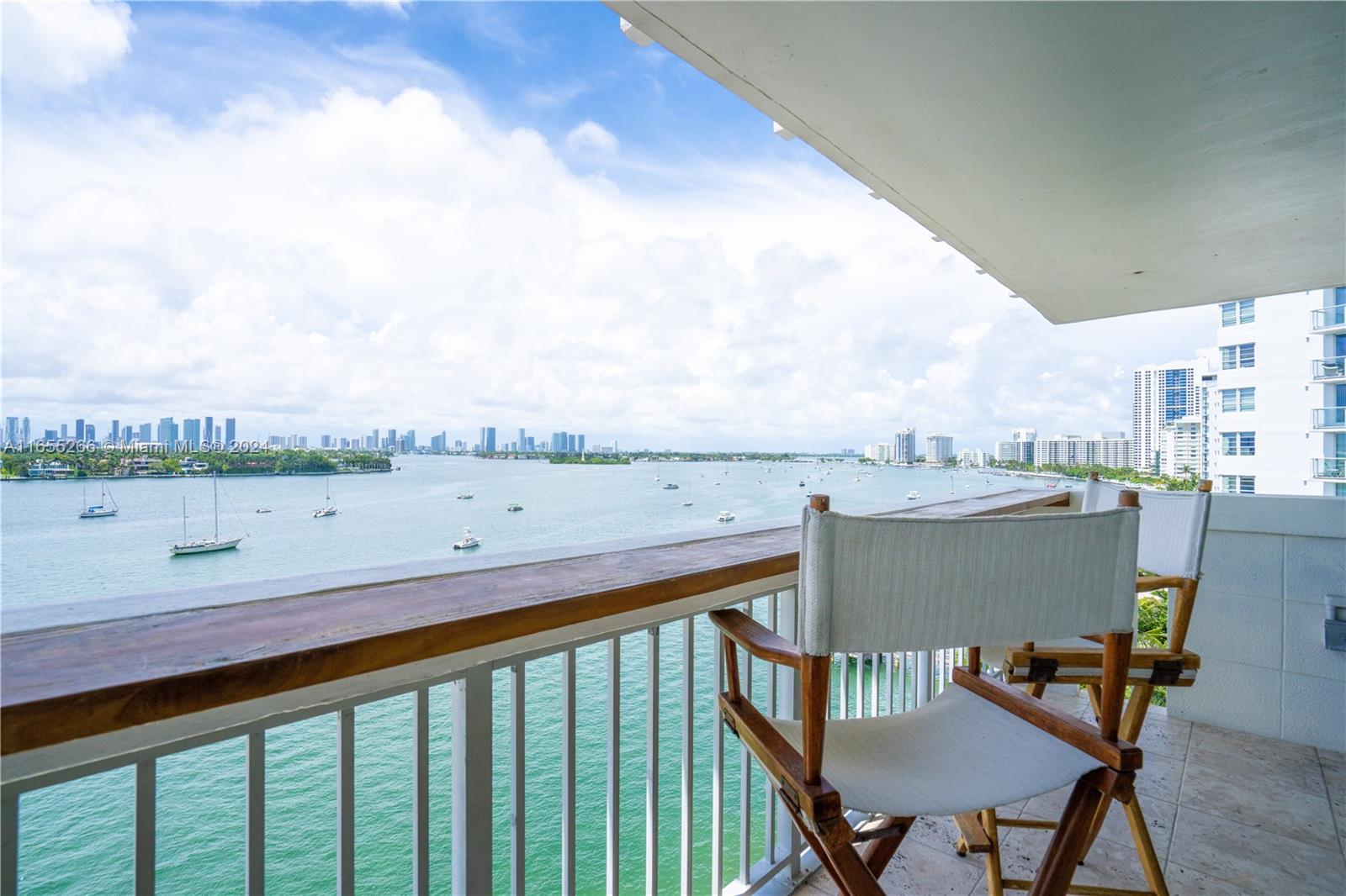 a view of a balcony with chairs