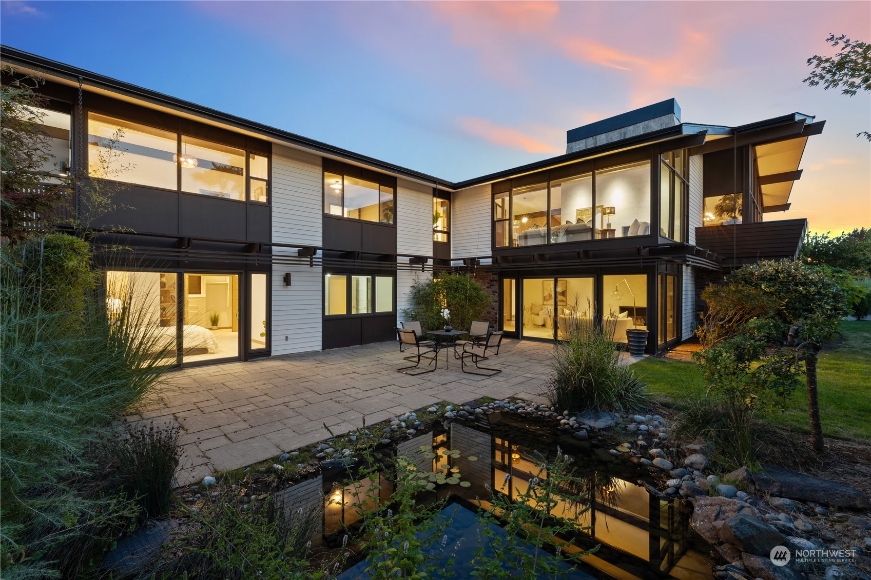 a view of swimming pool with outdoor seating