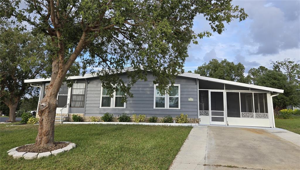 front view of a house with a yard