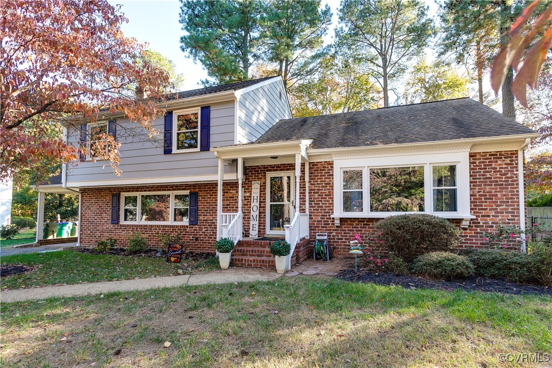 front view of a house with a yard