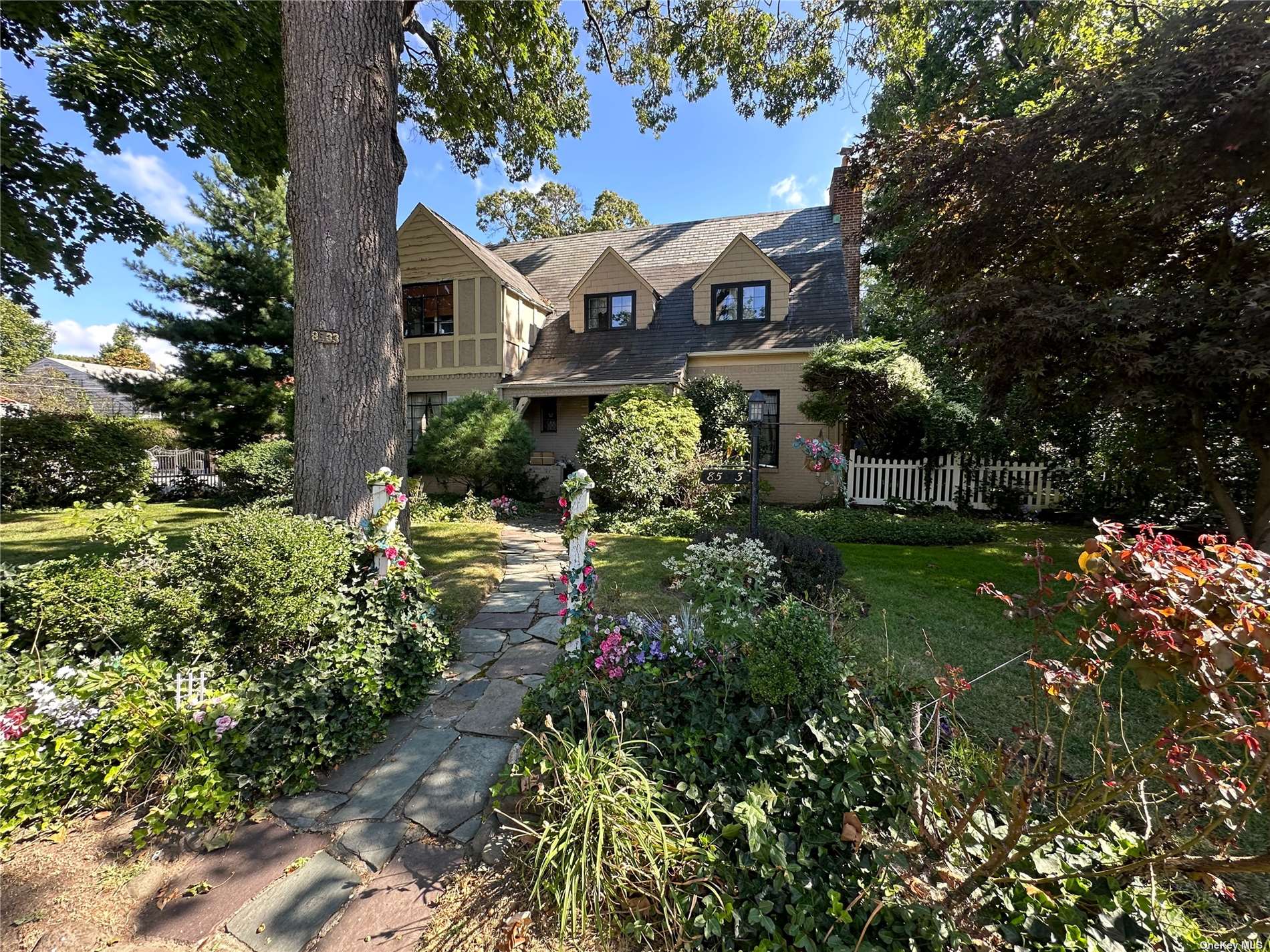 a view of a house with a garden