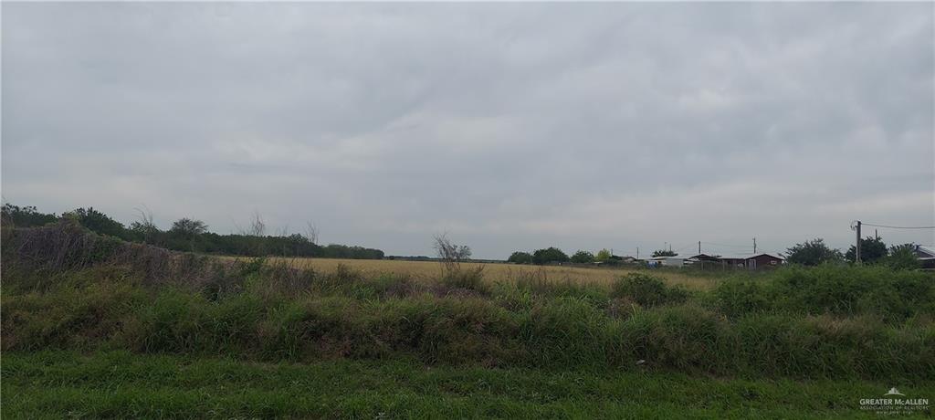 a view of mountain and yard