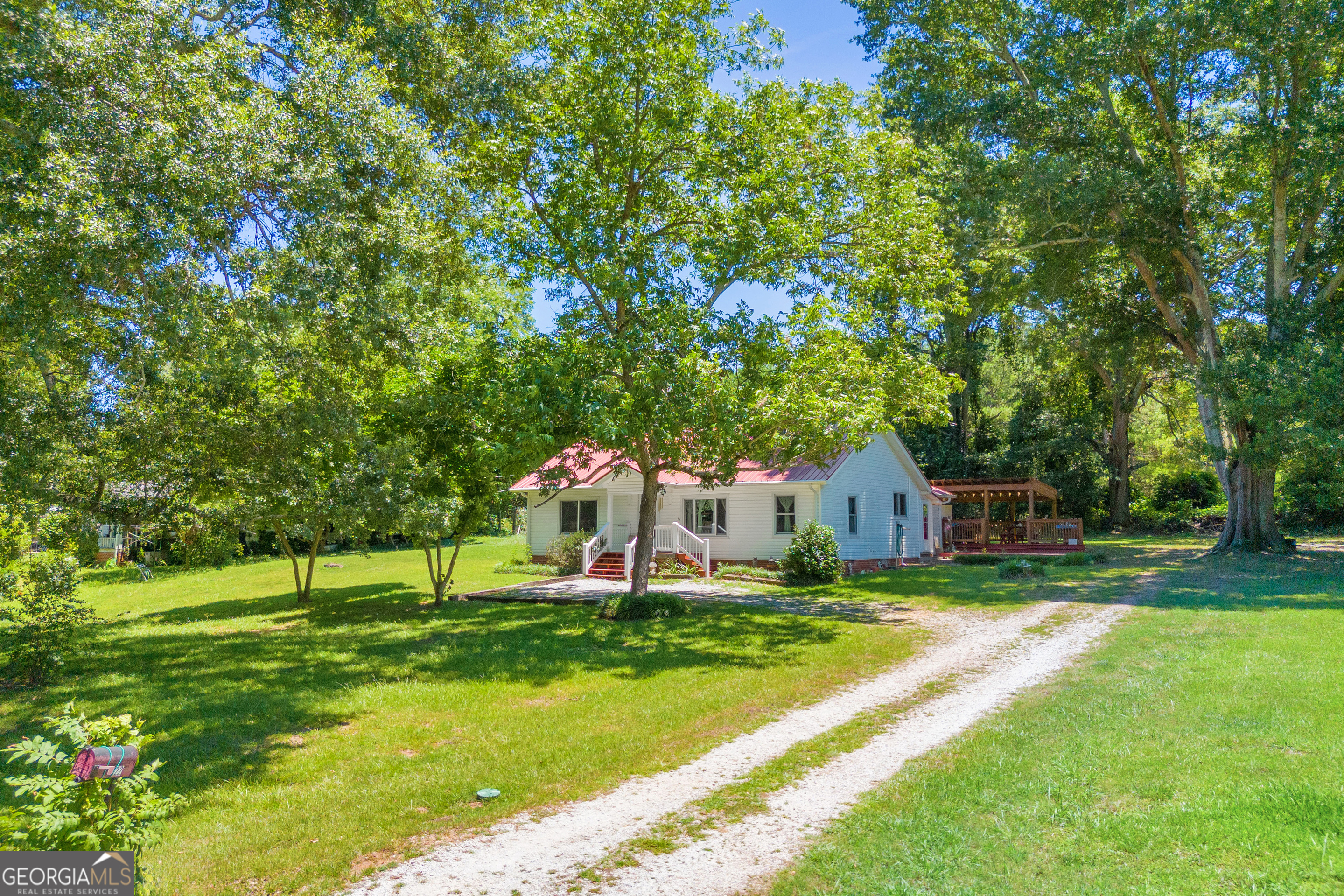 a view of a house with a big yard