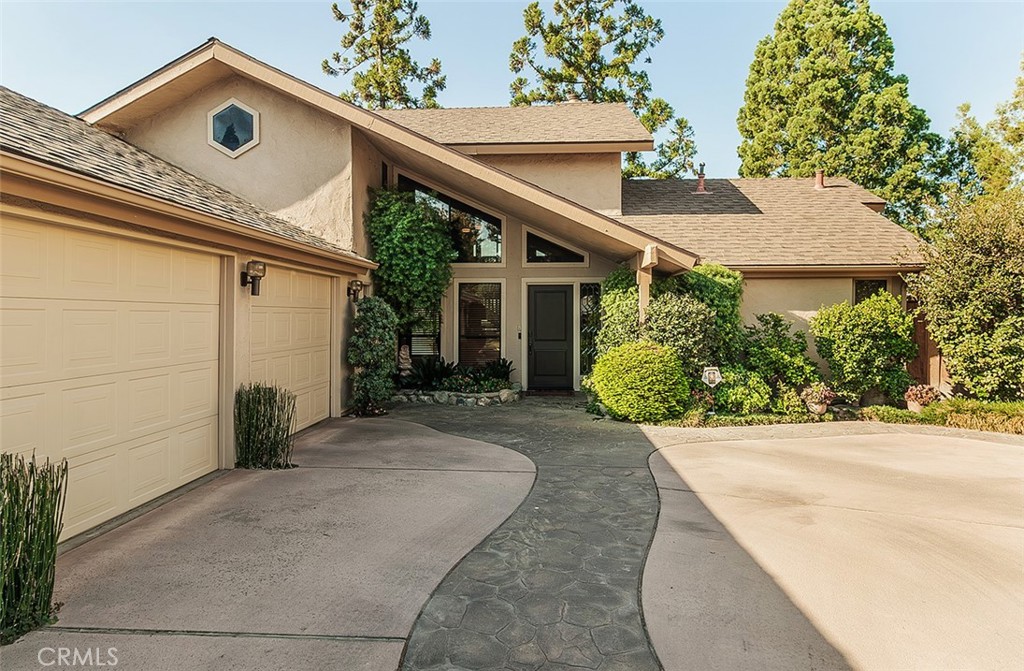 front view of a house with a small yard