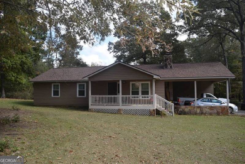 front view of a house with an outdoor space