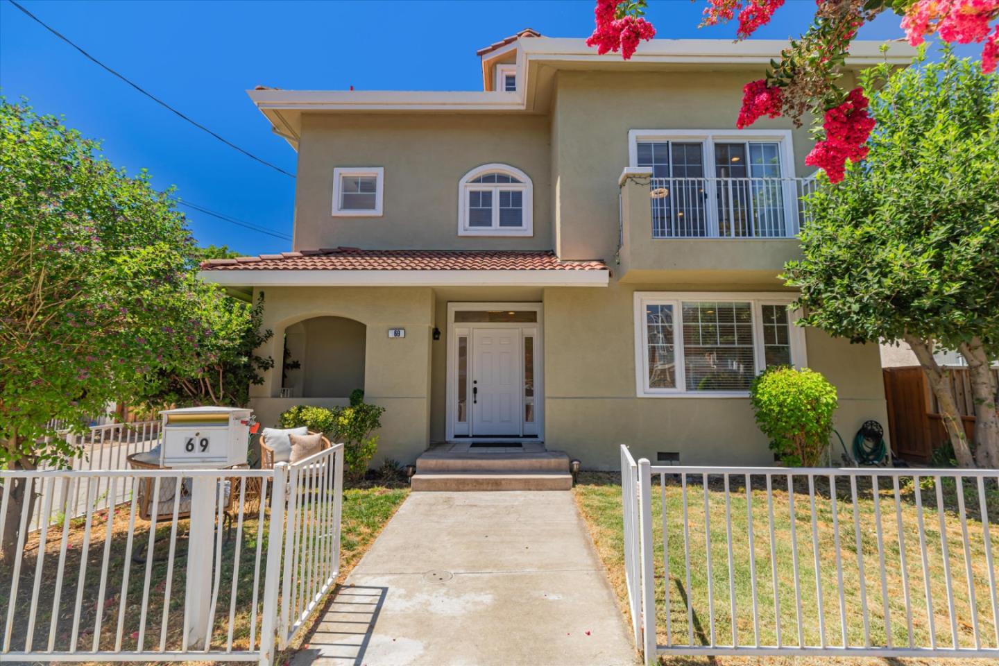 a front view of a house with a porch