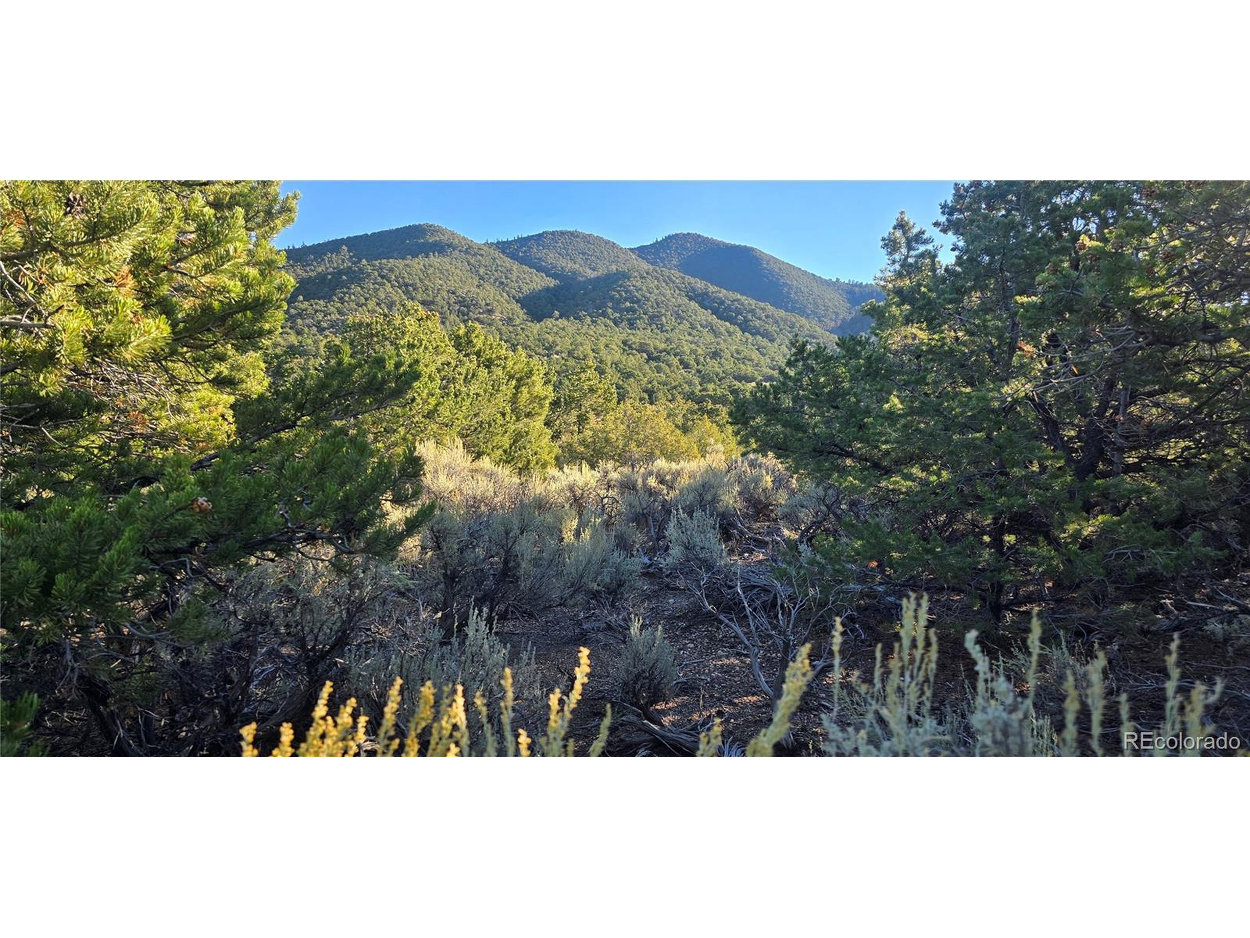 a view of an outdoor space and mountain view