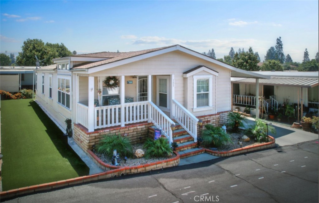 a front view of a house with porch