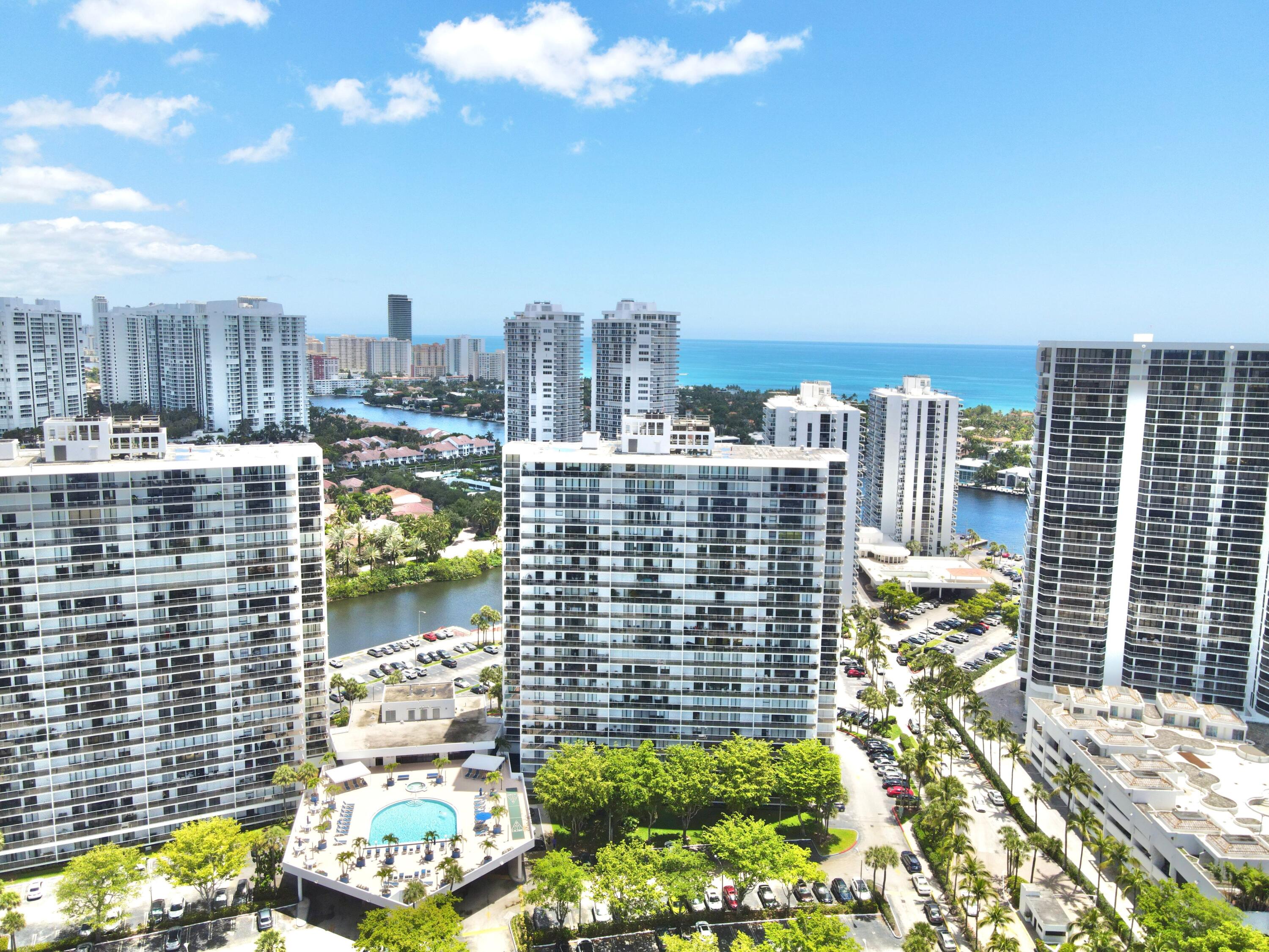 a view of a city with tall buildings