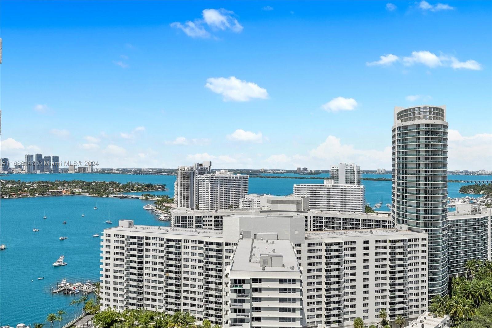 a view of city with tall buildings