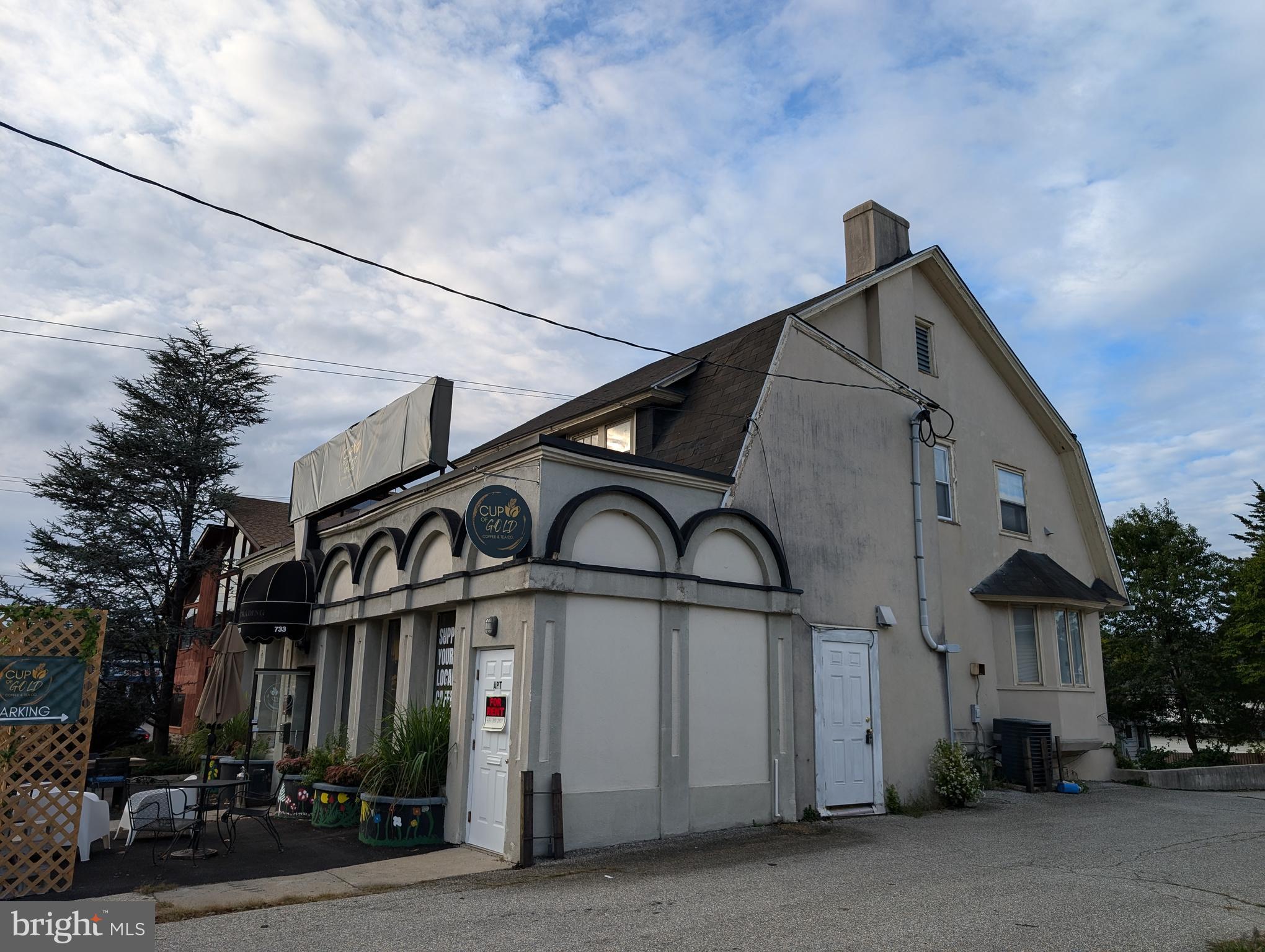 a front view of a building with street