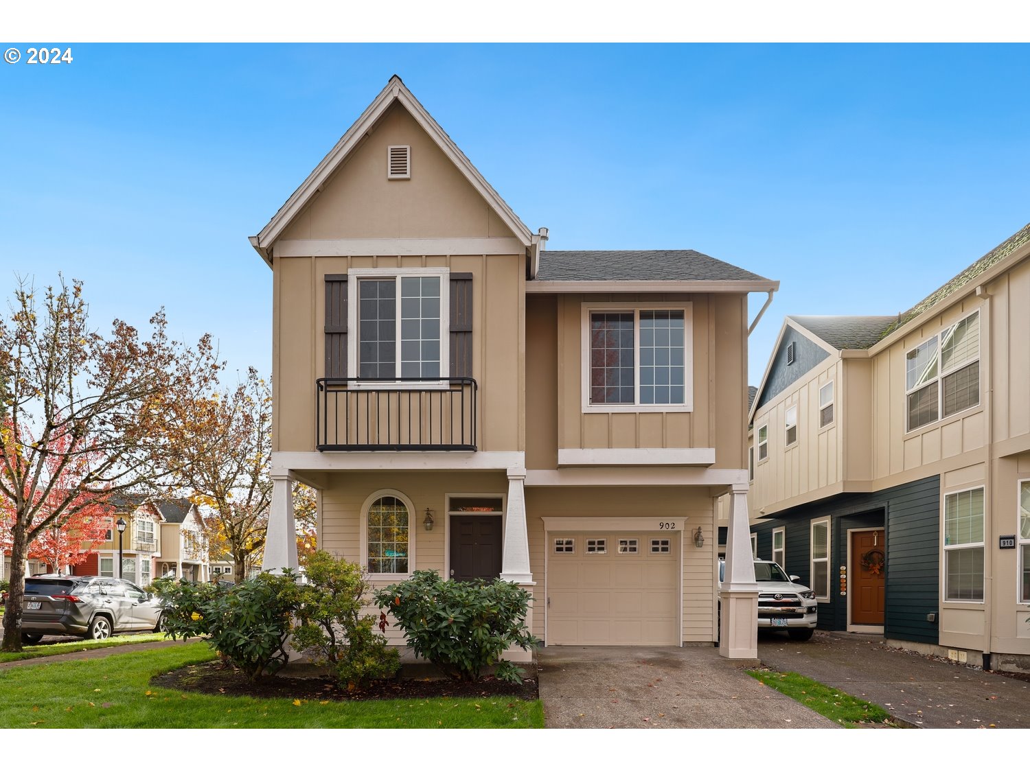 a front view of a house with a yard