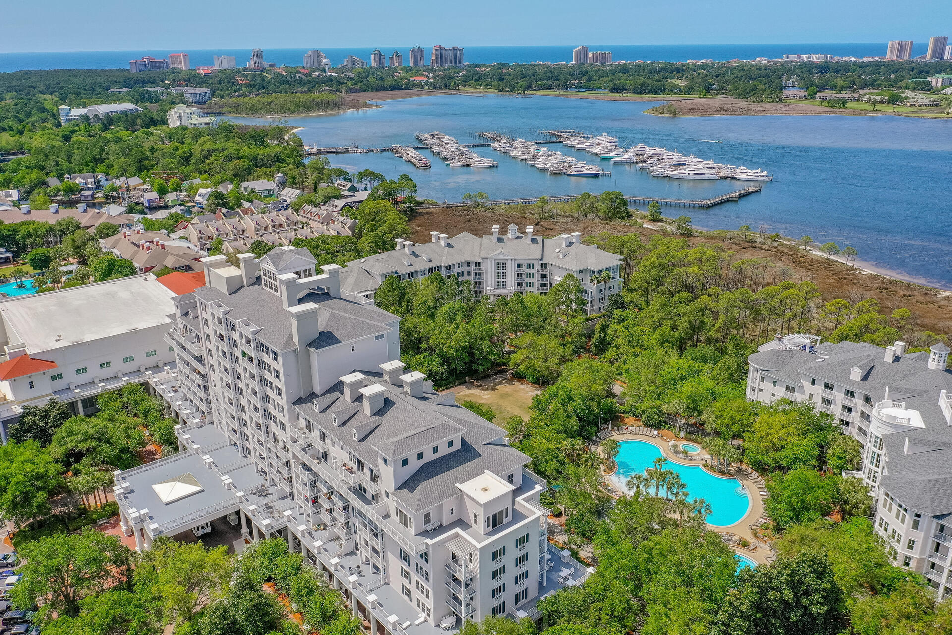 an aerial view of a city with lake view