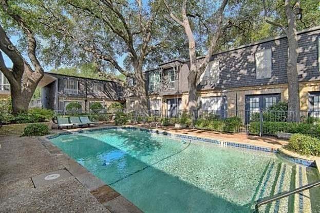 a view of a house with yard and tree s