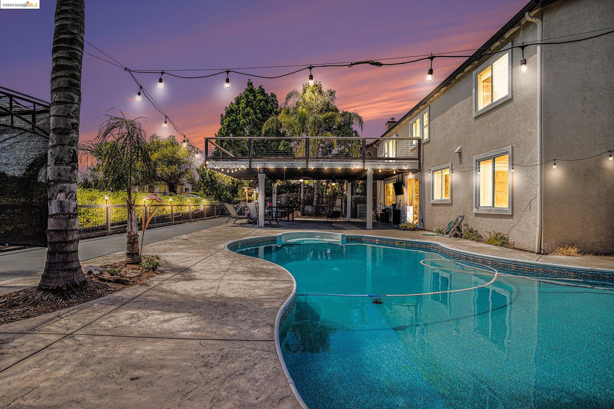 a view of a house with a swimming pool