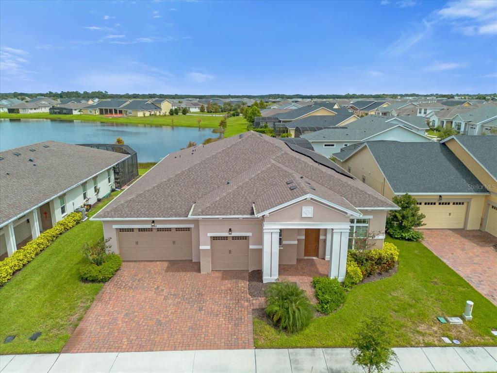 an aerial view of a house with a garden