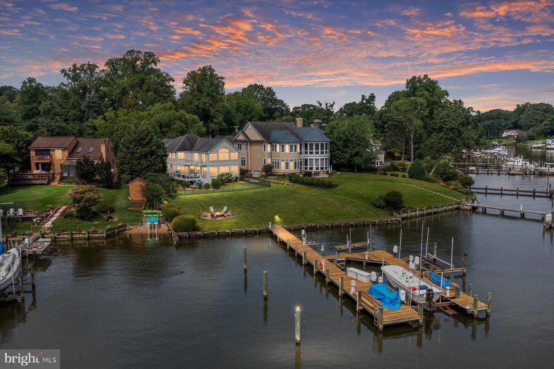 a view of a lake with a house in the background